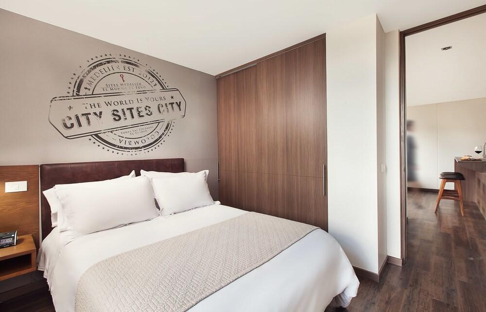 Sites Hotel Medellín Exteriér fotografie A bedroom in a typical apartment
