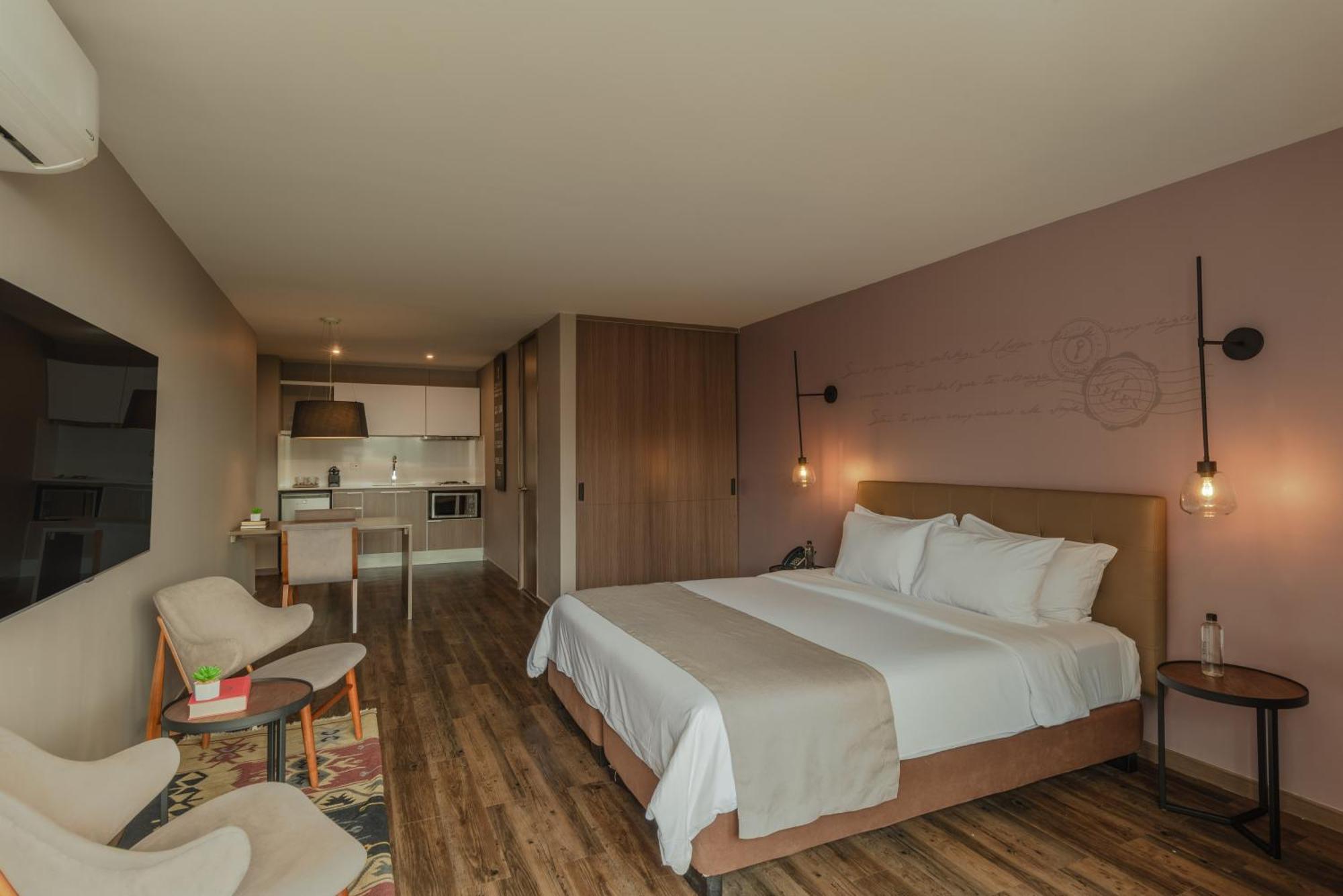 Sites Hotel Medellín Exteriér fotografie A room at the hotel