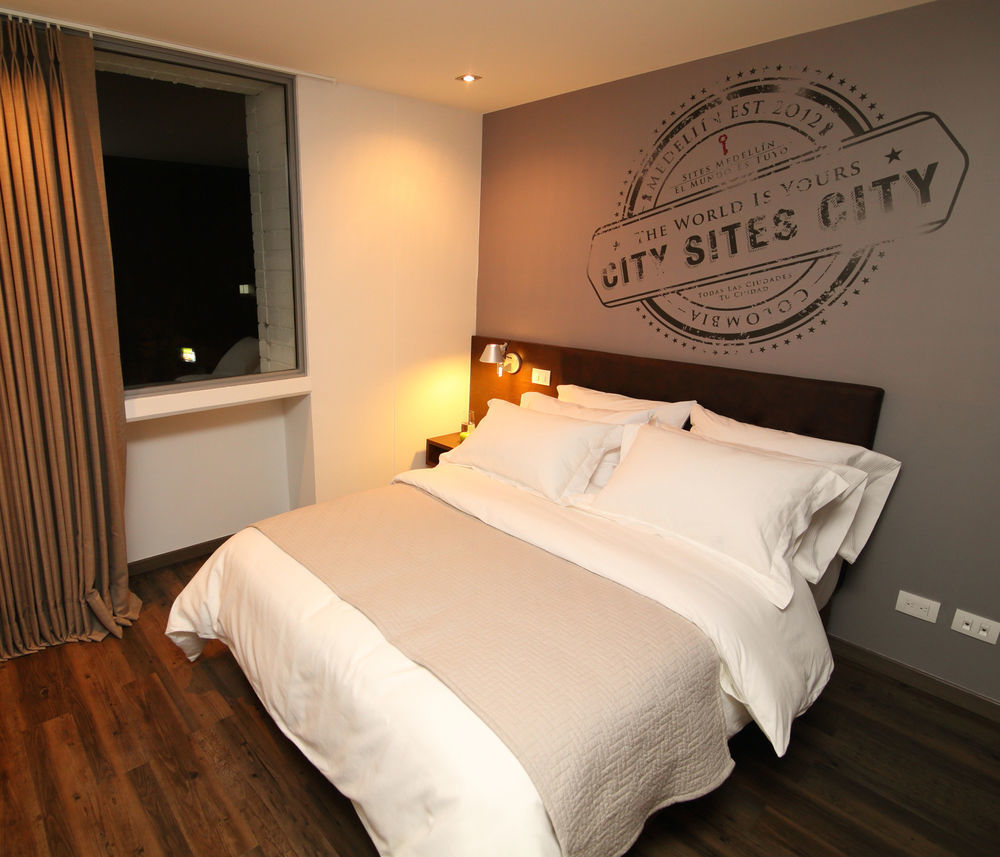 Sites Hotel Medellín Exteriér fotografie A bedroom at the hotel