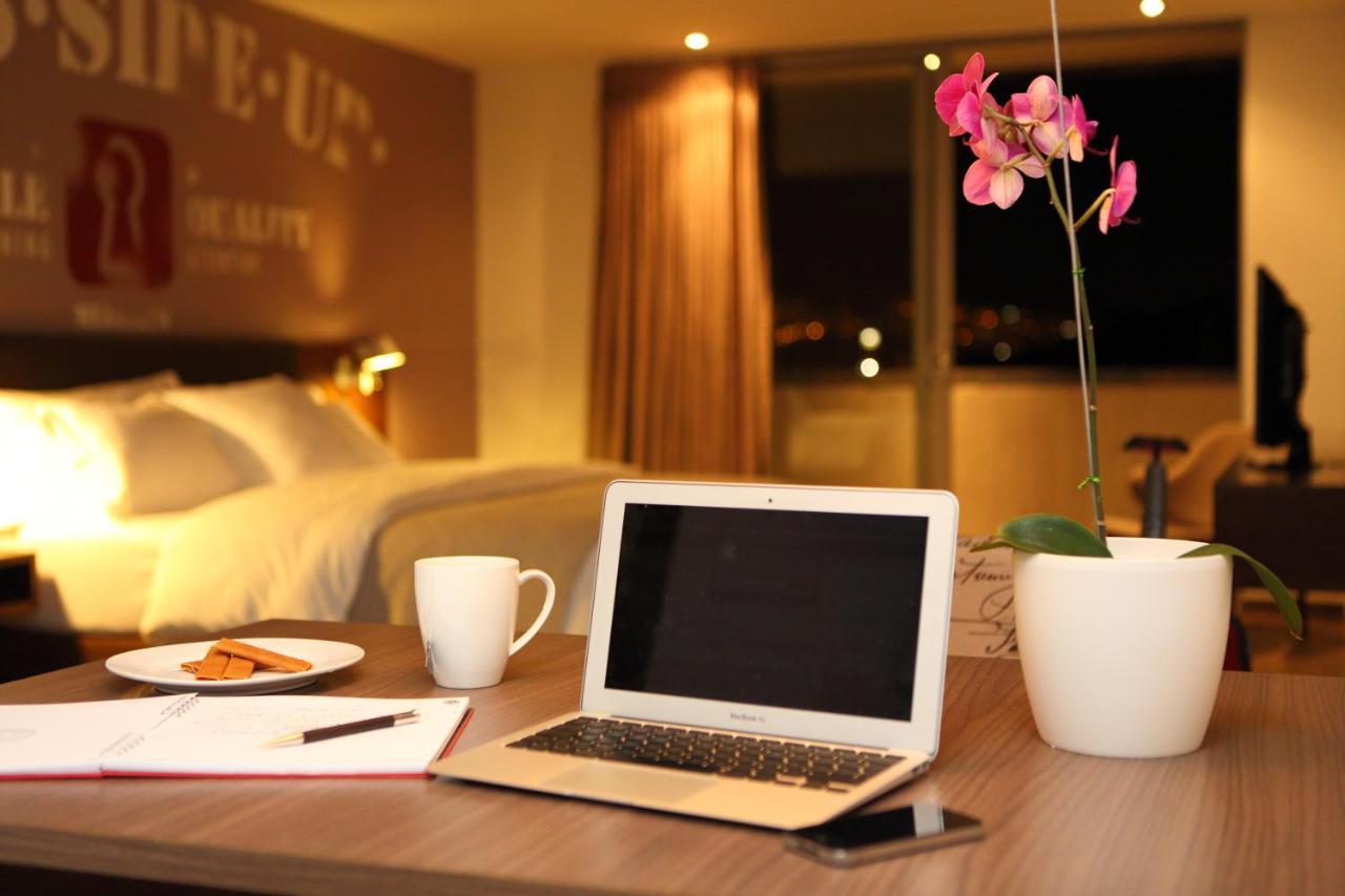 Sites Hotel Medellín Exteriér fotografie A laptop computer